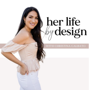 The image is a promotional photo for "her life by design," a podcast hosted by Christina Galbato. It shows a woman with long dark hair and a bright smile, looking at the camera. She is wearing an off-the-shoulder ruffled top in a pale peach color and white pants. To her right, the podcast title "her life by design" is written in a stylish, cursive black font, with "WITH CHRISTINA GALBATO" in smaller capital letters underneath. The background is plain white, drawing focus to the woman and the text. The overall impression is one of a lifestyle or personal branding theme.